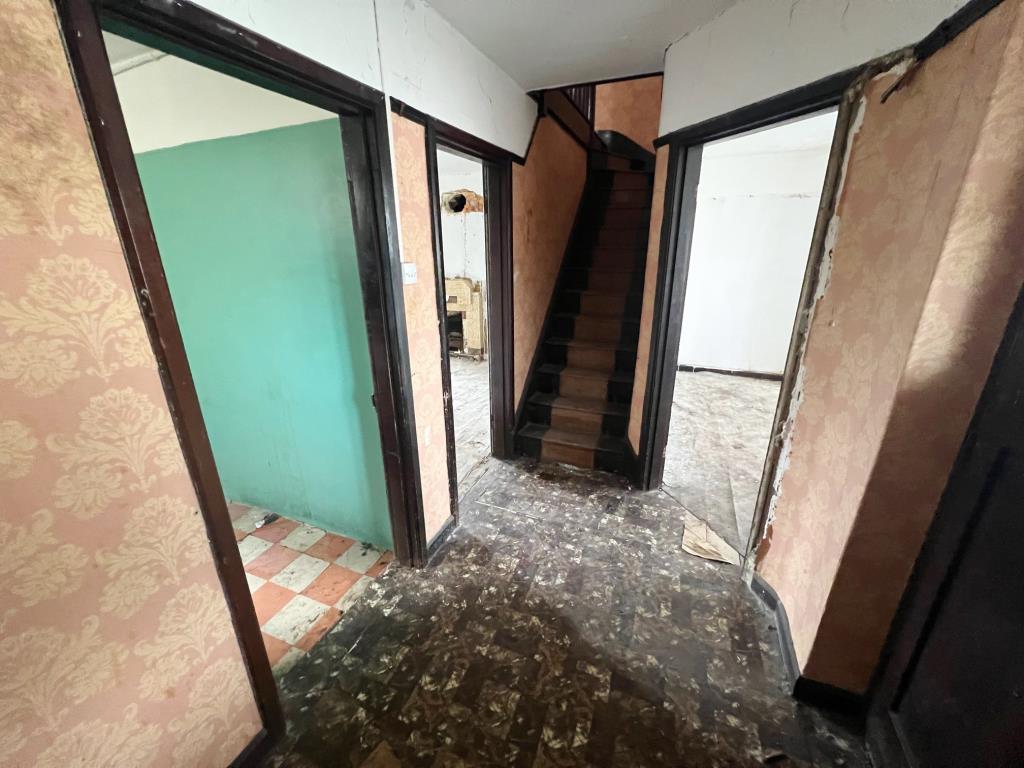 Lot: 139 - HOUSE FOR REFURBISHMENT AND RENOVATION - Entrance hall with stairs rising to first floor